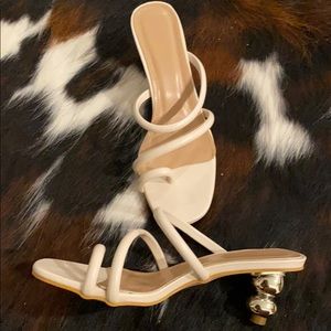 Cult Gaia-like architectural heel nude